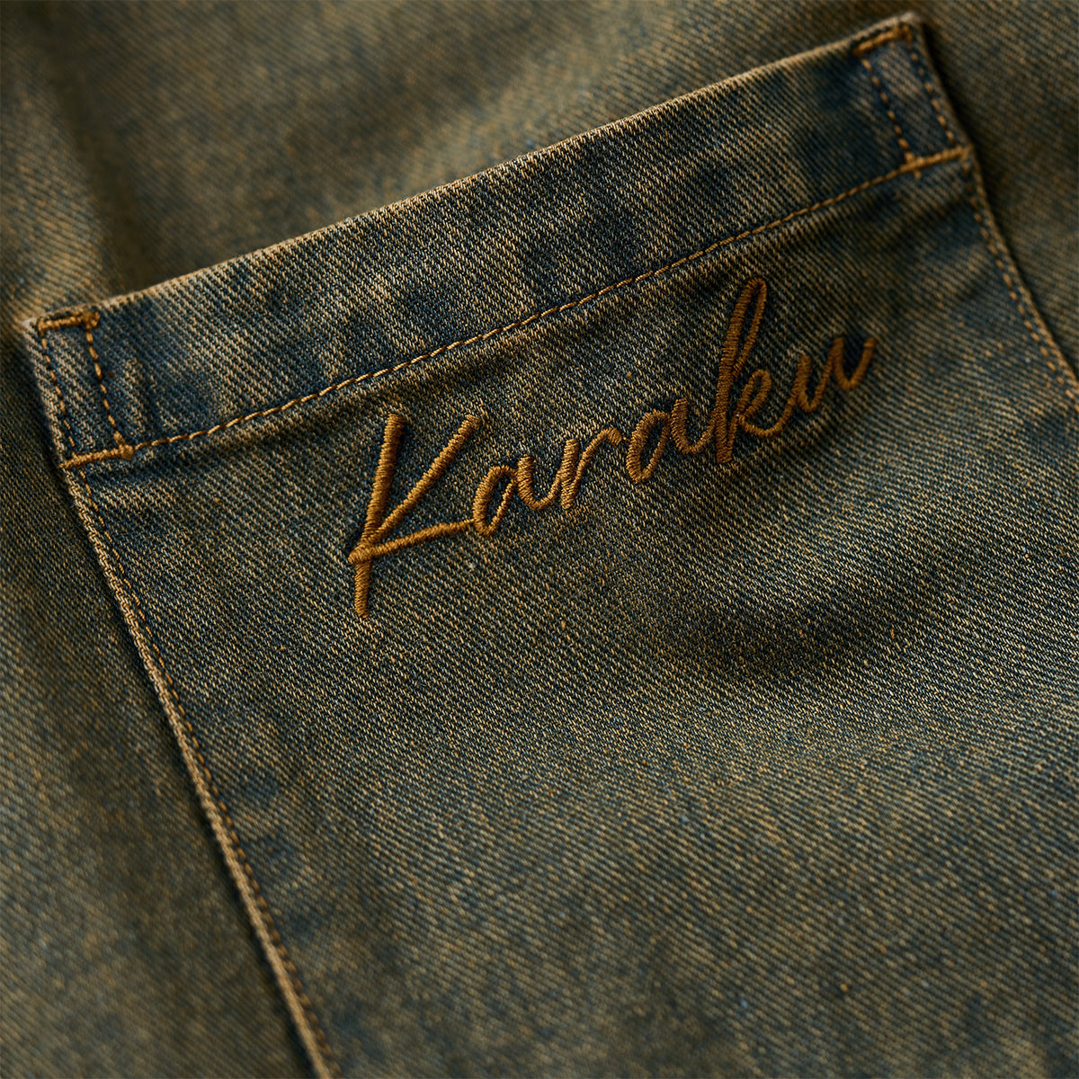 Karaku」刺繍入り 赤ヒモ付きウォッシュド加工デニムオープンカラー